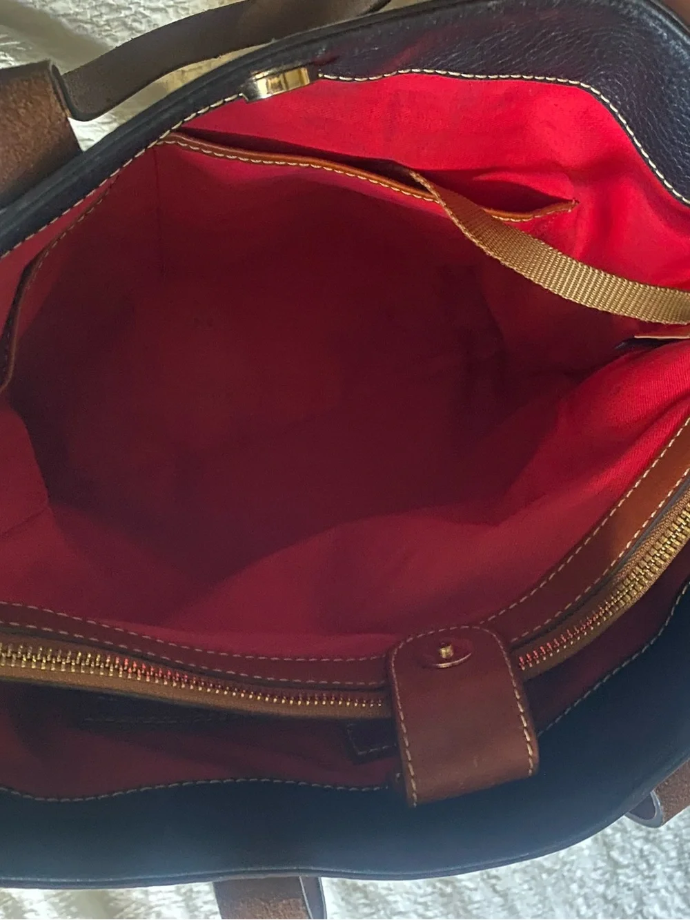 Dooney & Bourke Black Pebble Leather Messenger with Brown Accents
